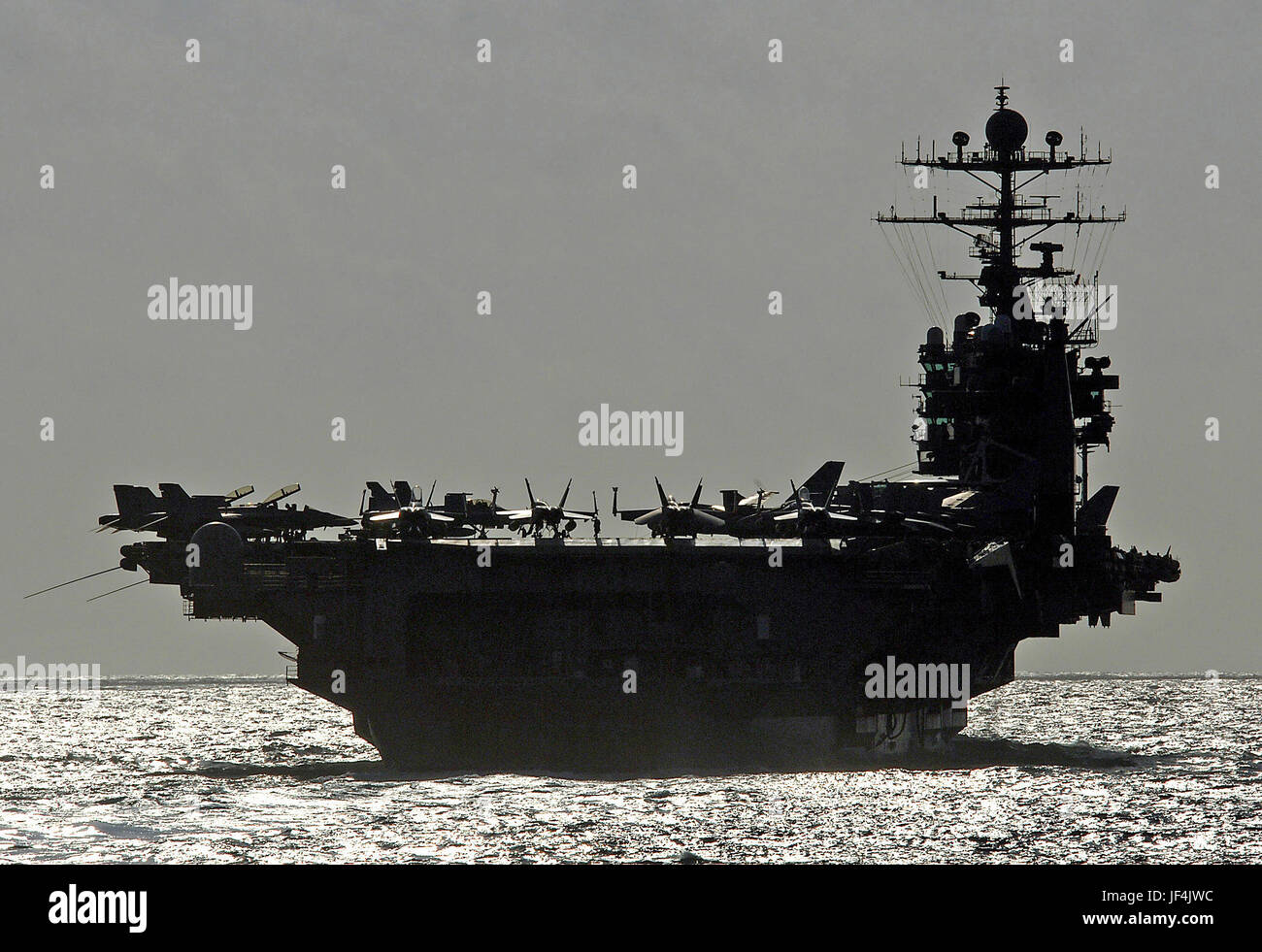 The aircraft carrier USS George Washington (CVN 73) prepares to conduct a refueling at sea with the guided missile cruiser USS Monterey (CG 61) as the two ships operate in the Caribbean. DoD photo by Petty Officer 3rd Class Michael D. Blackwell II, U.S. Navy. Stock Photo