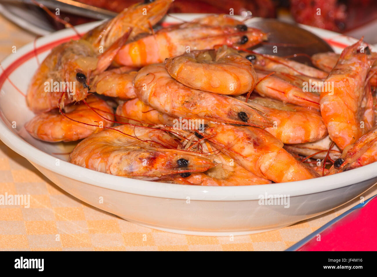 Grilled prawns on a plate. Stock Photo