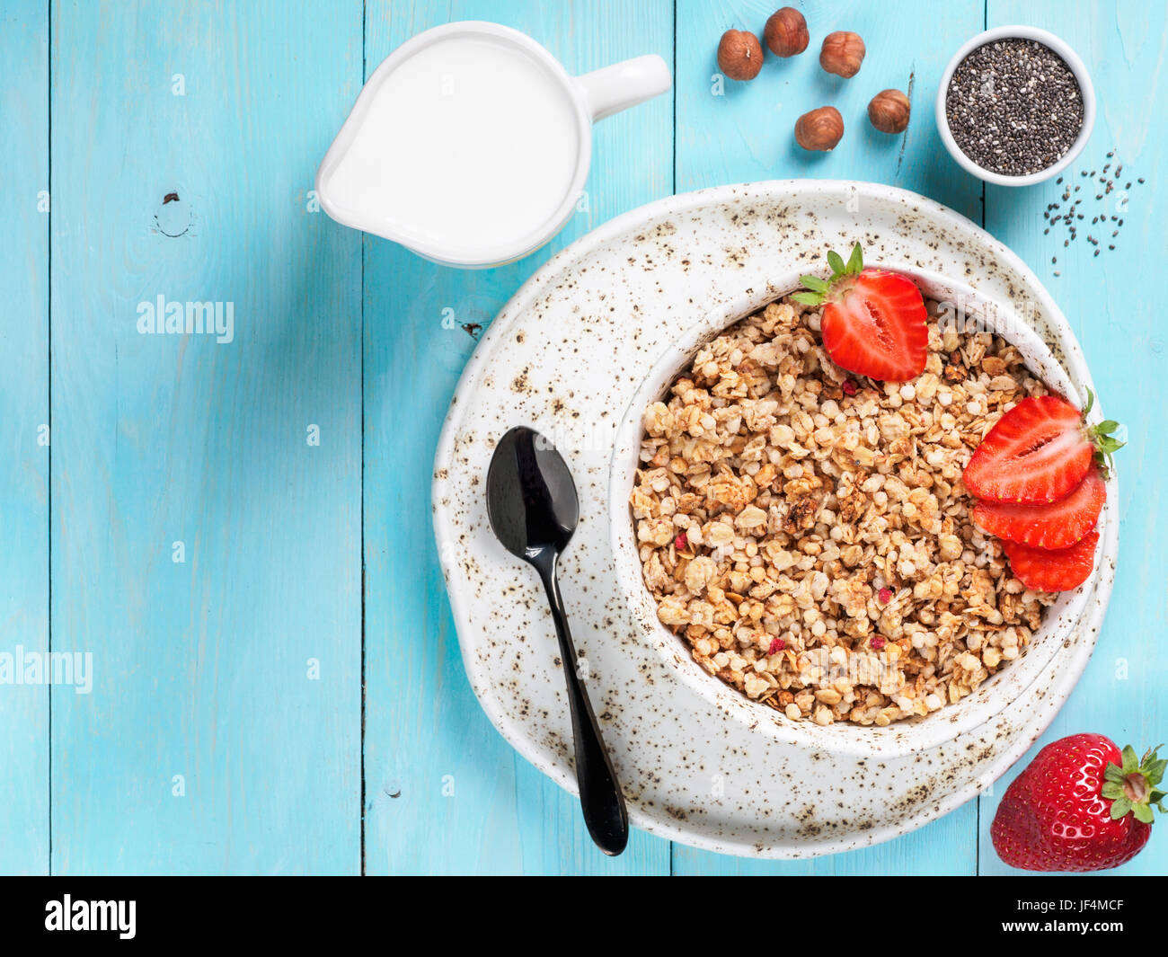 Bowl With Muesli, Fresh Strowberry, Nuts, Chia Seeds And Milk Stock 