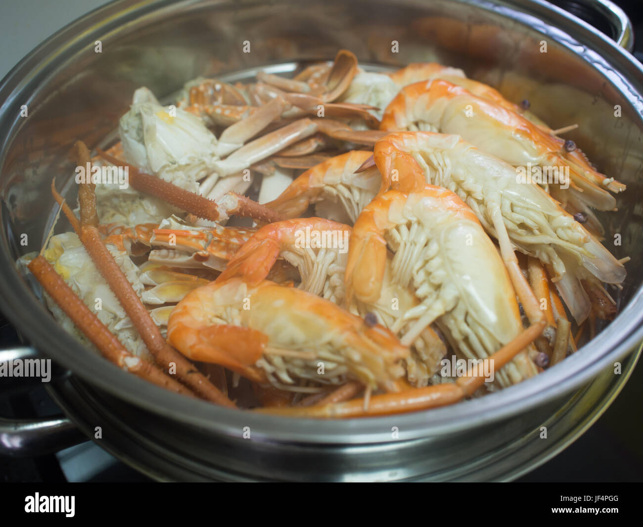 Shrimp and Crab cooked by steam in stainless steel steamer pot