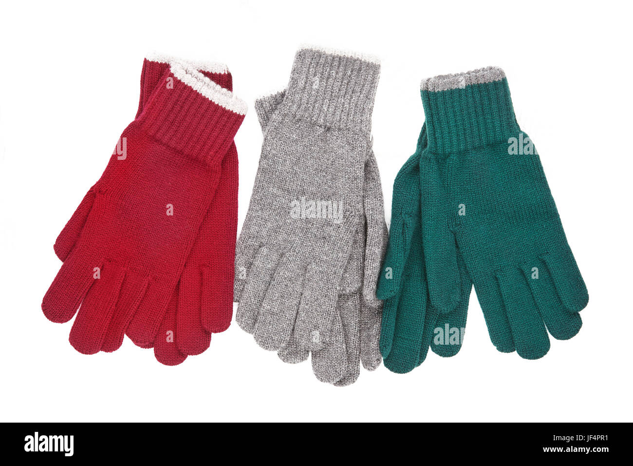 three pairs of knitted gloves Stock Photo Alamy