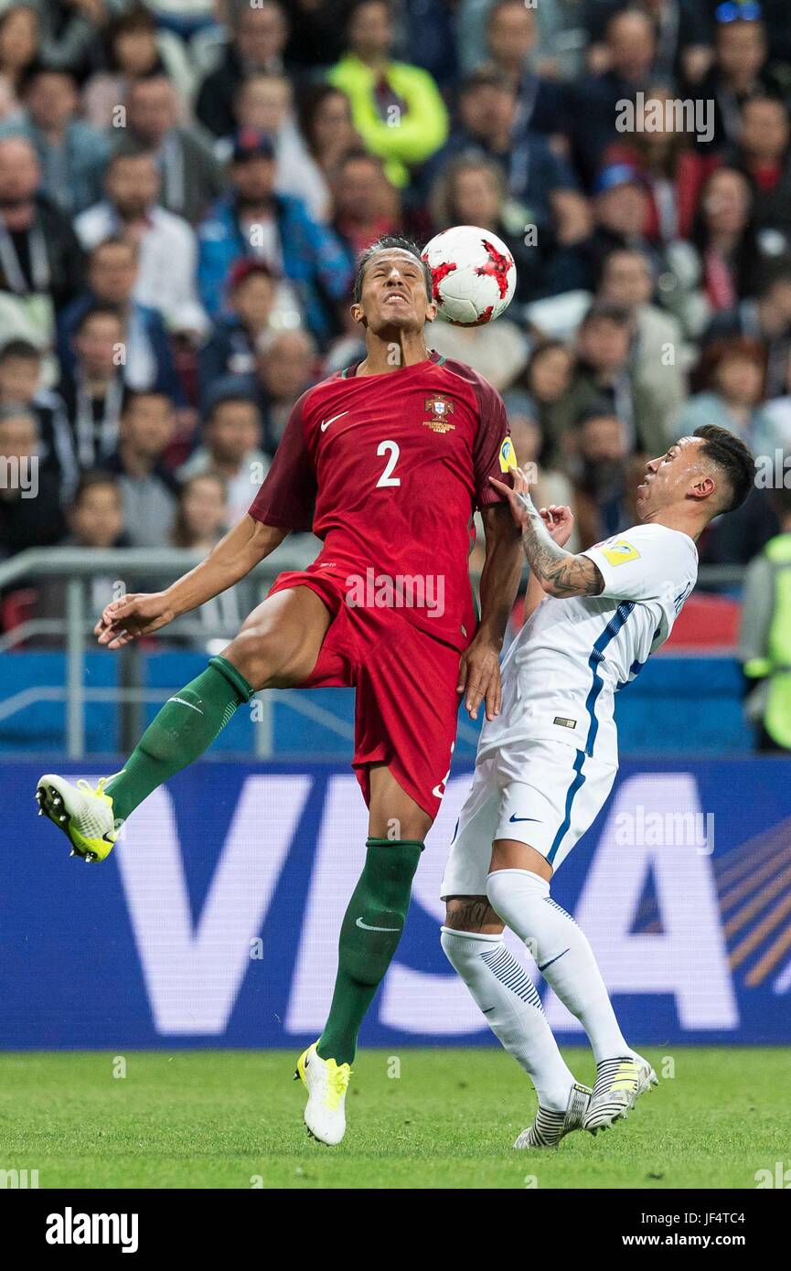 Kazan, Russia. 28th June, 2017. Bruno Alves (L) of Portugal vies for the ball during the FIFA Confederations Cup 2017 semifinal match against Chile in Kazan, Russia, June 28, 2017. Credit: Evgeny Sinitsyn/Xinhua/Alamy Live News Stock Photo