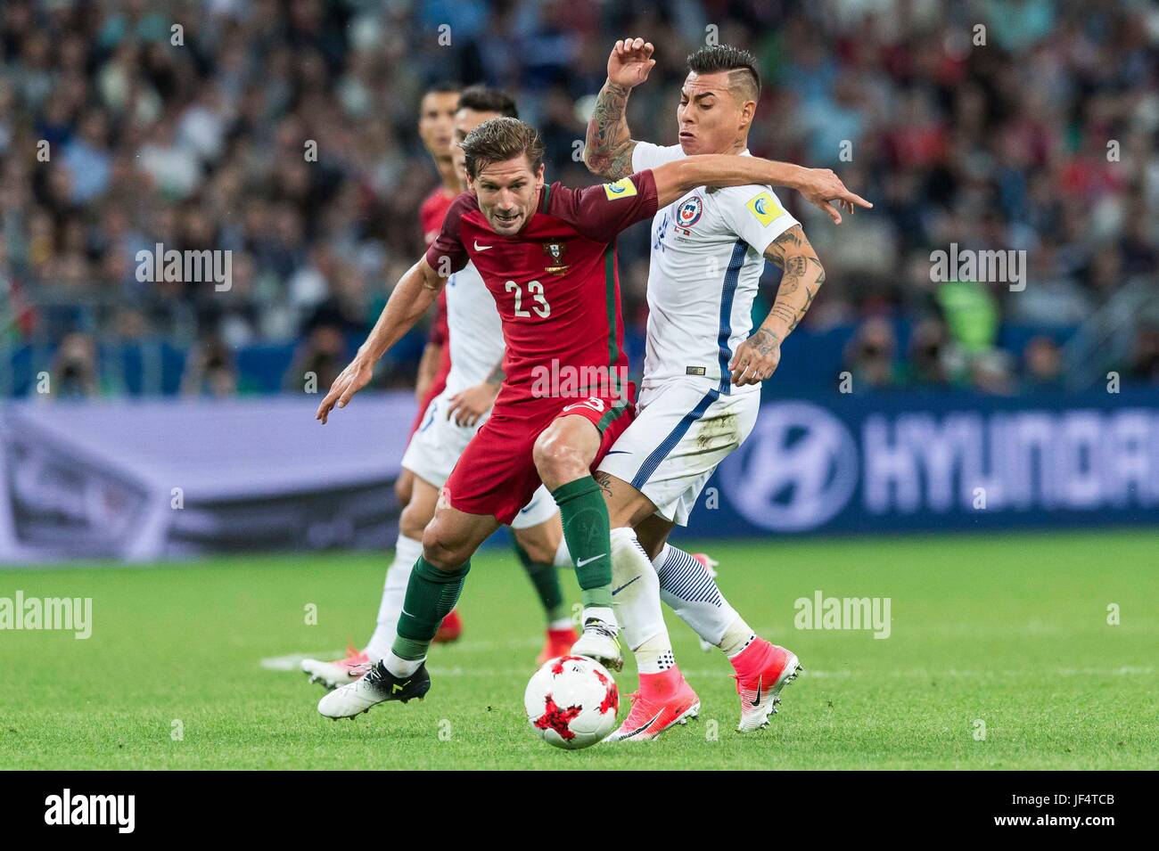 Kazan, Russia. 28th June, 2017. Andrien Silva (L) of Portugal vies for the ball with Eduardo Vargas of Chile during the FIFA Confederations Cup 2017 semifinal match in Kazan, Russia, June 28, 2017. Credit: Evgeny Sinitsyn/Xinhua/Alamy Live News Stock Photo