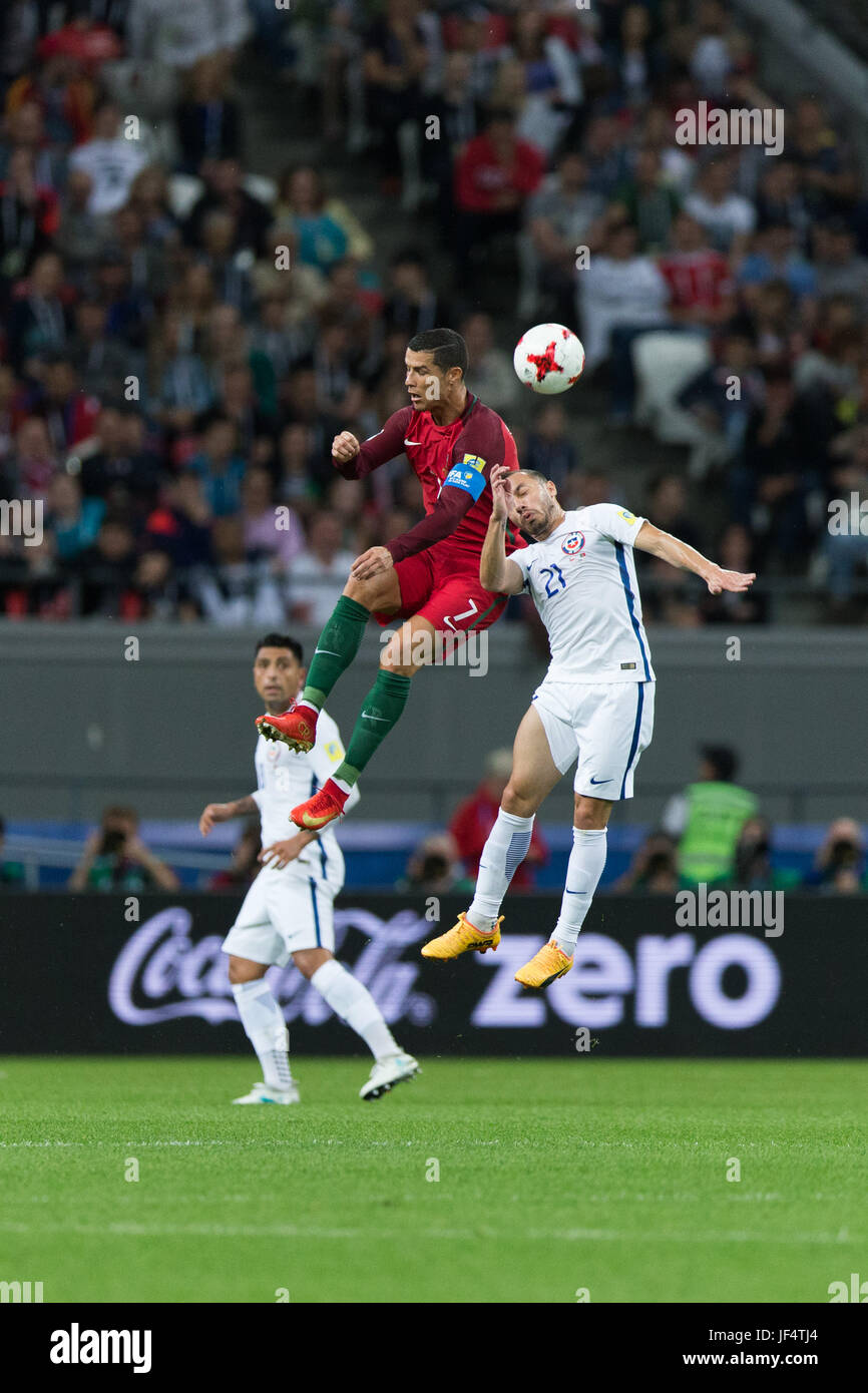Kazan, Russia. 28th June, 2017. Cristiano Ronaldo (top) of Portugal vies with Marcelo Diaz (R) of Chile during the FIFA Confederations Cup 2017 semifinal match in Kazan, Russia, June 28, 2017. Credit: Bai Xueqi/Xinhua/Alamy Live News Stock Photo