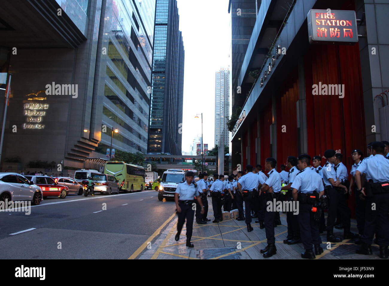 Heavy police presence on Harbour Road, Wanchai, guarding President Xi Jinping in the Convention and Exhibition Centre opposite the fire station Stock Photo