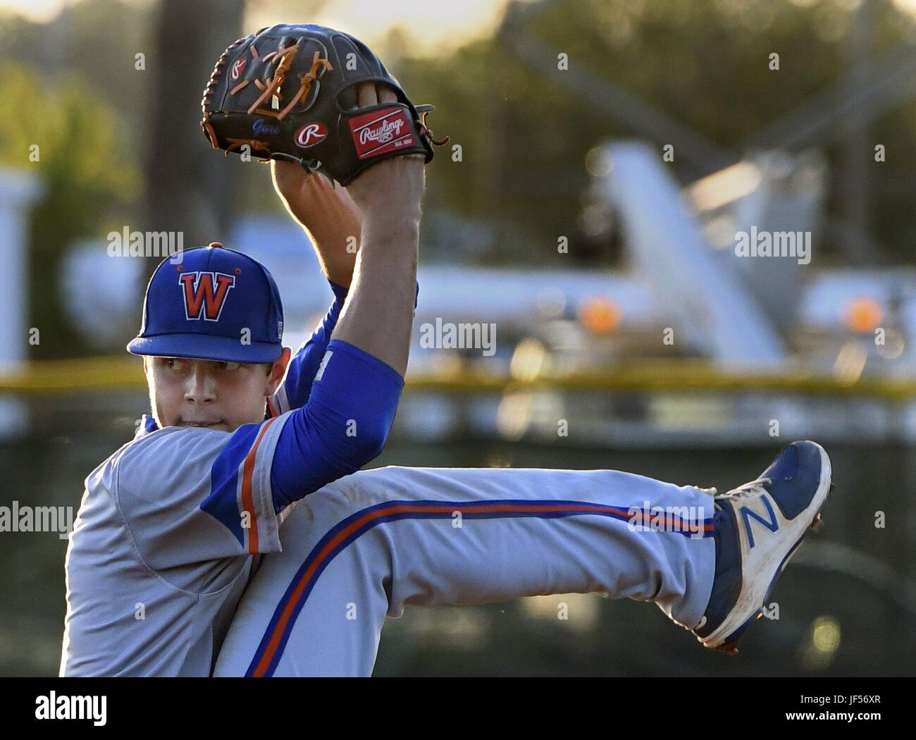 May 16, 2017 - Williamston, NC, USA - Whiteville's Mackenzie Gore goes into the top of his wind-up as he pitches to a better in Williamston, N.C. Wednesday, May 16, 2017. Gore, a senior at Whiteville High School in southeastern North Carolina is predicted to be taken in the top five of the Major League Baseball draft.  He led his NCHSAA 1A team to the state championship for the third time in four years. (Credit Image: © Chuck Liddy/News Observer via ZUMA Wire) Stock Photo