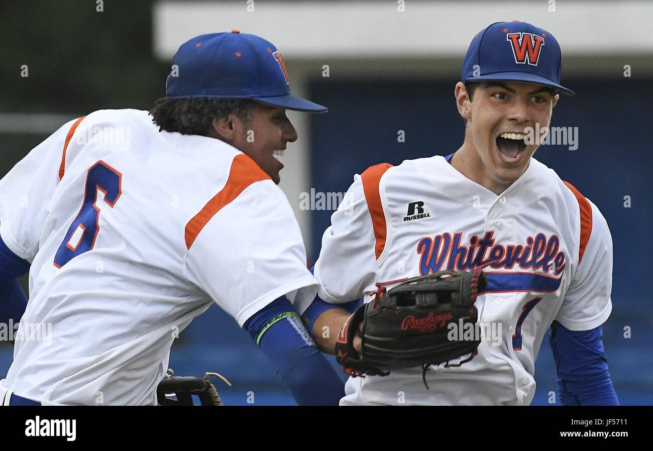 Whiteville, NC, USA. 13th May, 2017. Earl Grubbs (6) celebrats with teammate Mackenzie Gore after Gore threw out a runner from center field as they attempted to tag up and score from third base in Whiteville, N.C., Saturday, May 13, 2017. Credit: Chuck Liddy/News Observer/ZUMA Wire/Alamy Live News Stock Photo