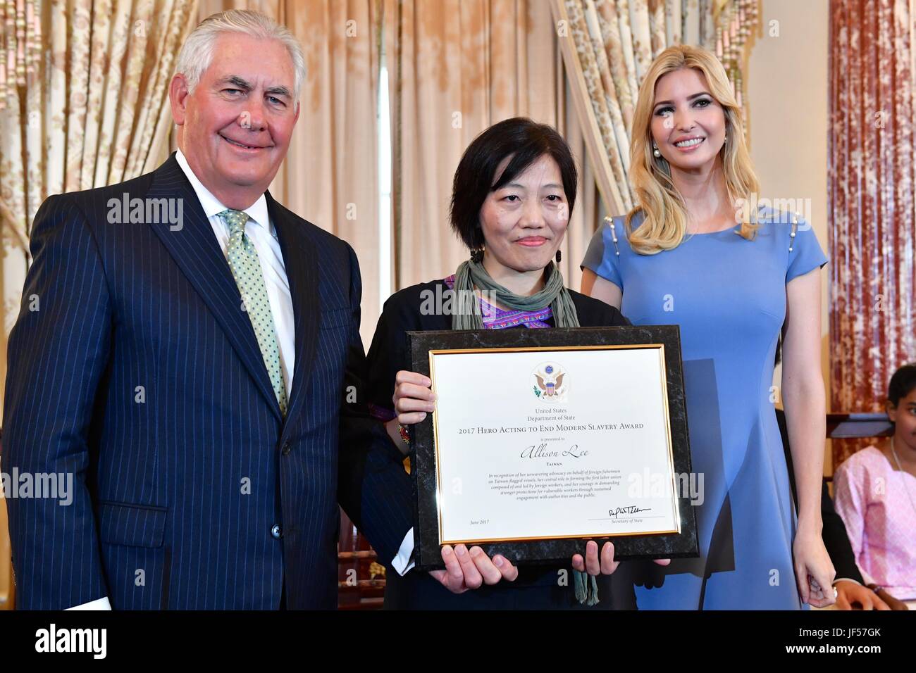 U.S. Secretary of State Rex Tillerson and Ivanka Trump, right, daughter