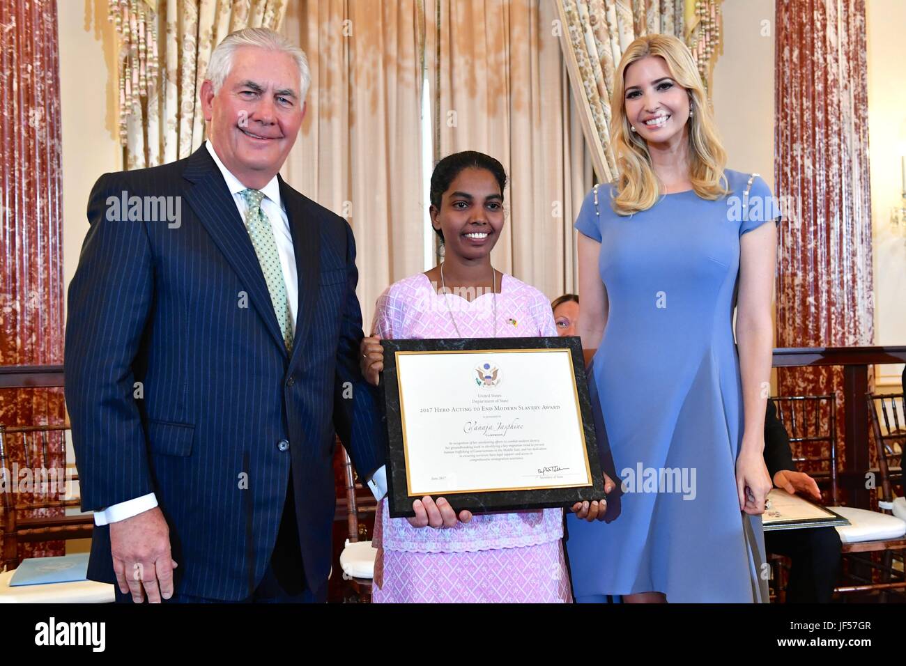 U.S. Secretary of State Rex Tillerson and Ivanka Trump, right, daughter