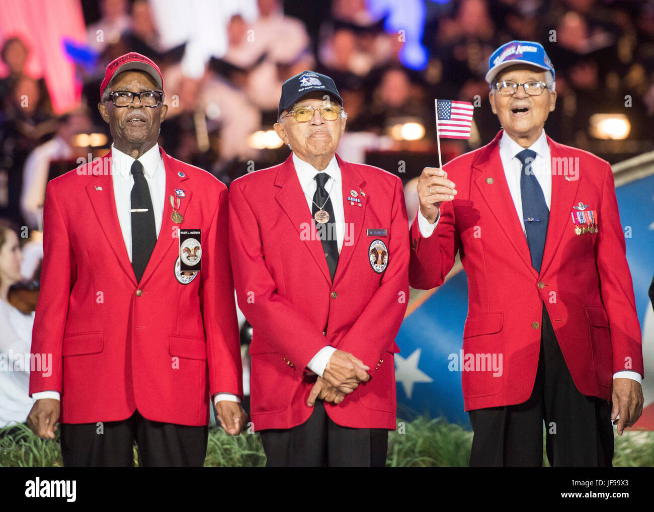 Tuskegee Airmen walk onstage during the National Memorial Day Concert at the west lawn of the U.S. Capitol, Washington, D.C., May 28, 2017. The concert’s mission is to unite the country in remembrance and appreciation of the fallen and to serve those who are grieving. (Dept. of Defense photo by Navy Petty Officer 2nd Class Dominique A. Pineiro/Released) Stock Photo