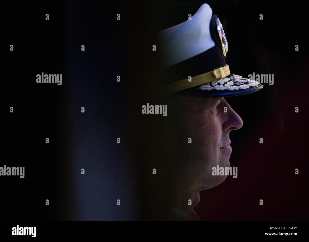 Navy Adm. John M. Richardson, Chief of Naval Operations, waits backstage at the National Memorial Day Concert at the west lawn of the U.S. Capitol, Washington, D.C., May 28, 2017. The concert’s mission is to unite the country in remembrance and appreciation of the fallen and to serve those who are grieving. (Dept. of Defense photo by Navy Petty Officer 2nd Class Dominique A. Pineiro/Released) Stock Photo