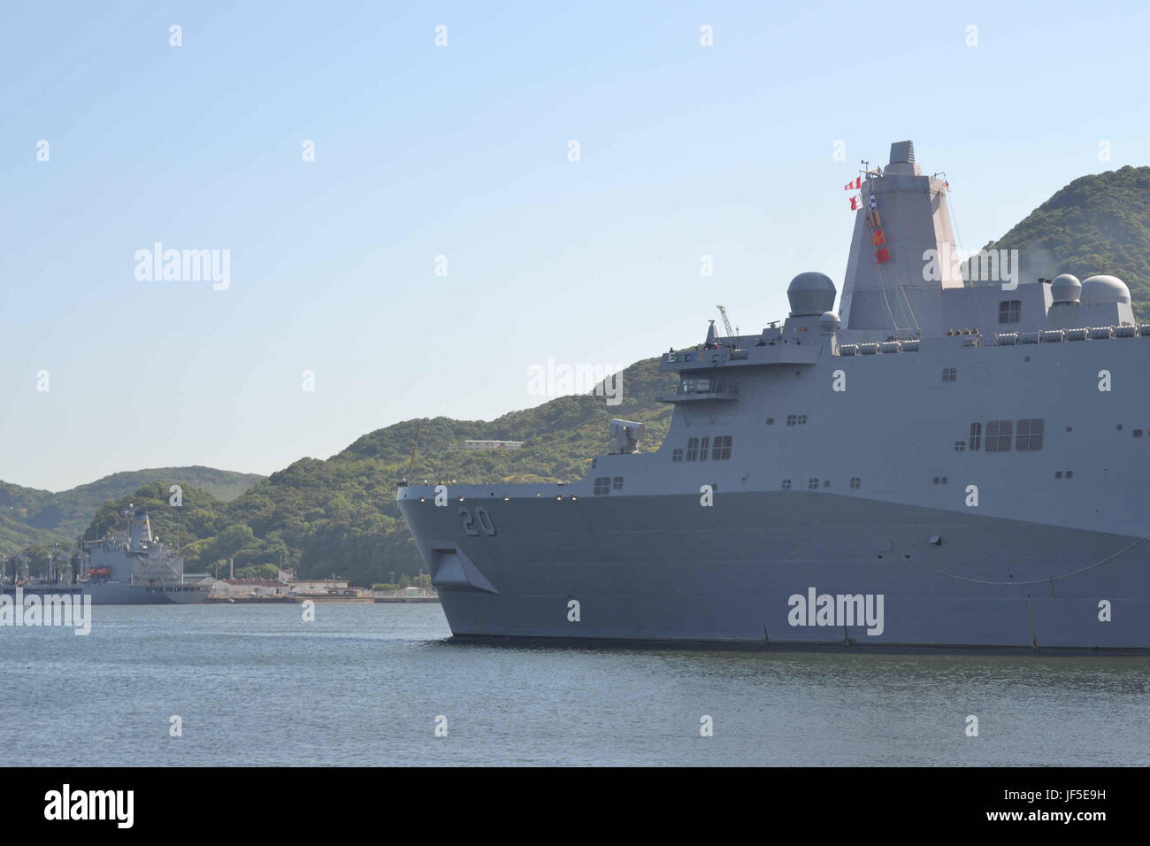 170602-N-IO414-016 SASEBO, Japan (June 2, 2017) Amphibious transport dock USS Green Bay (LPD 20) departs Fleet Activities Sasebo, Japan so it can begin its routine patrol. Green Bay will operate in the Indo-Asia-Pacific region to enhance partnerships and be a ready-response force for any type of contingency. (U.S. Navy photo by Mass Communication Specialist 2nd Class Jordan Crouch/Released) Stock Photo