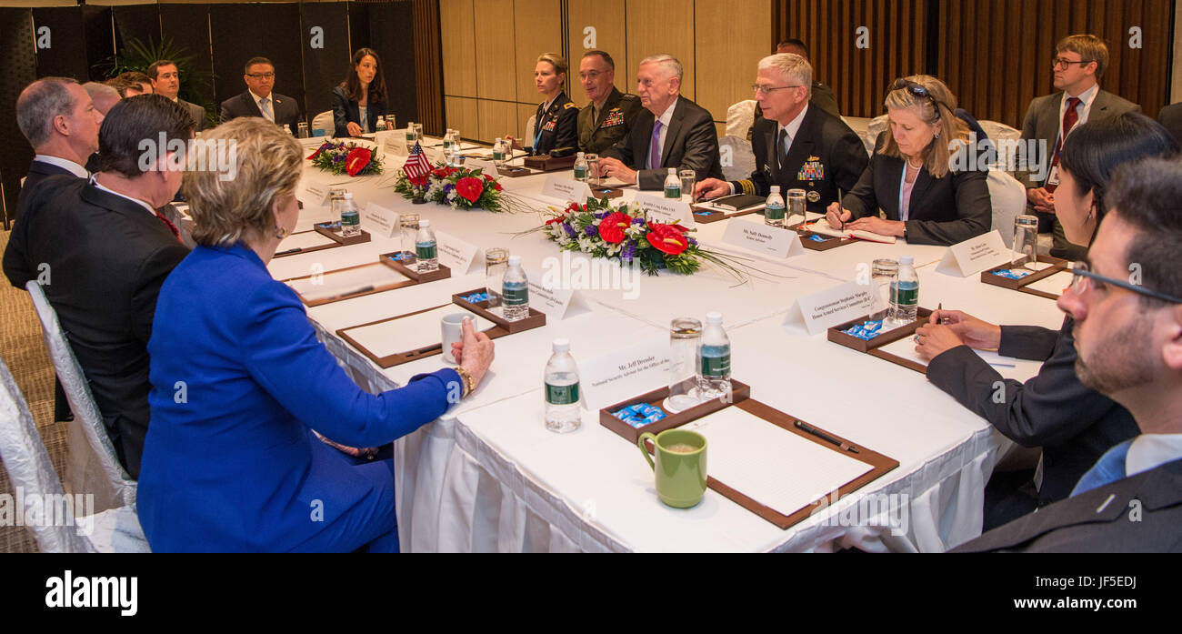 Secretary of Defense Jim Mattis and Chairman of the Joint Chiefs of Staff Gen. Joseph Dunford meet with the U.S. House Armed Services Committee during the International Institute for Strategic Studies 16th Asia Security Summit in Singapore on June 3, 2017. Stock Photo