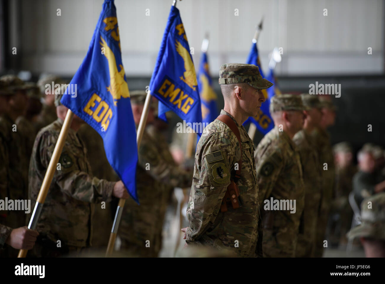 Col. Jason Bailey, the 455th Expeditionary Operations Group commander, stands at parade rest during a change of command ceremony at Bagram Airfield, Afghanistan, June 3, 2017. During the ceremony, Brig. Gen. Jim Sears relinquished command of the 455th Air Expeditionary Wing to Brig. Gen Craig Baker. (U.S. Air Force photo by Staff Sgt. Benjamin Gonsier) Stock Photo