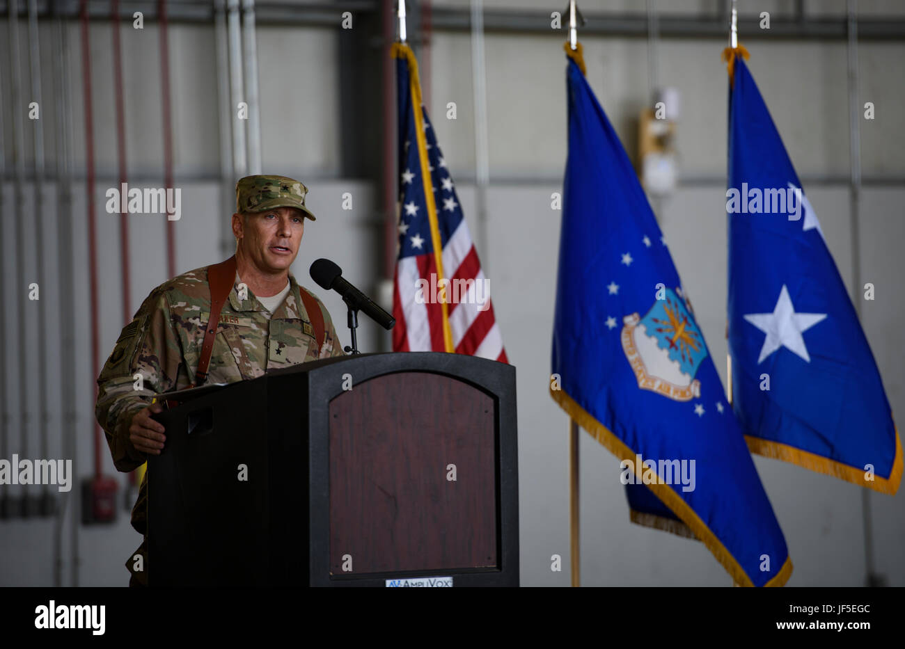 Brig. Gen. Craig Baker, the 455th Air Expeditionary Wing commander, speaks to 455th AEW Airmen and distinguished guests during a change of command ceremony at Bagram Airfield, Afghanistan, June 3, 2017. As the commander of the 455th AEW, Baker will lead the premier counterterrorism air mission in Afghanistan. The wing’s operations enable the NATO Resolute Support mission to successfully train, advise, and assist the military and security forces of Afghanistan, while restricting and deterring the terrorist threat in the region. (U.S. Air Force photo by Staff Sgt. Benjamin Gonsier) Stock Photo