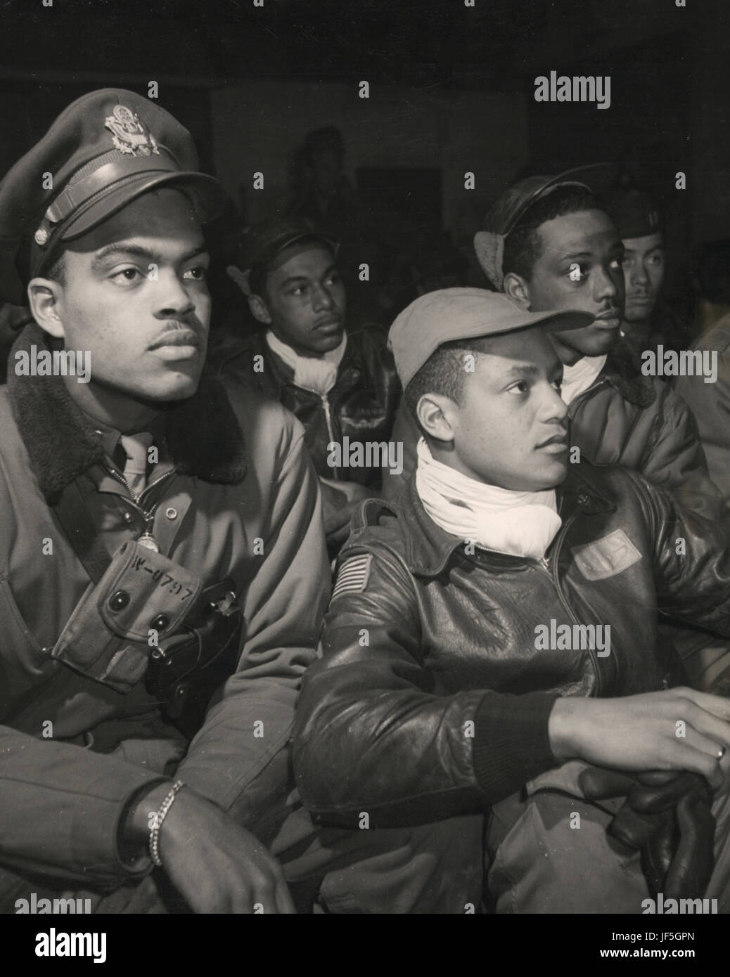 The Tuskegee Airmen is the popular name of a group of African-American military pilots who fought in World War II. Officially, they formed the 332nd Fighter Group and the 477th Bombardment Group of the United States Army Air Forces. All black military pilots who trained in the United States trained at Moton Field, the Tuskegee Army Air Field, and were educated at Tuskegee University, located near Tuskegee, Alabama. Stock Photo