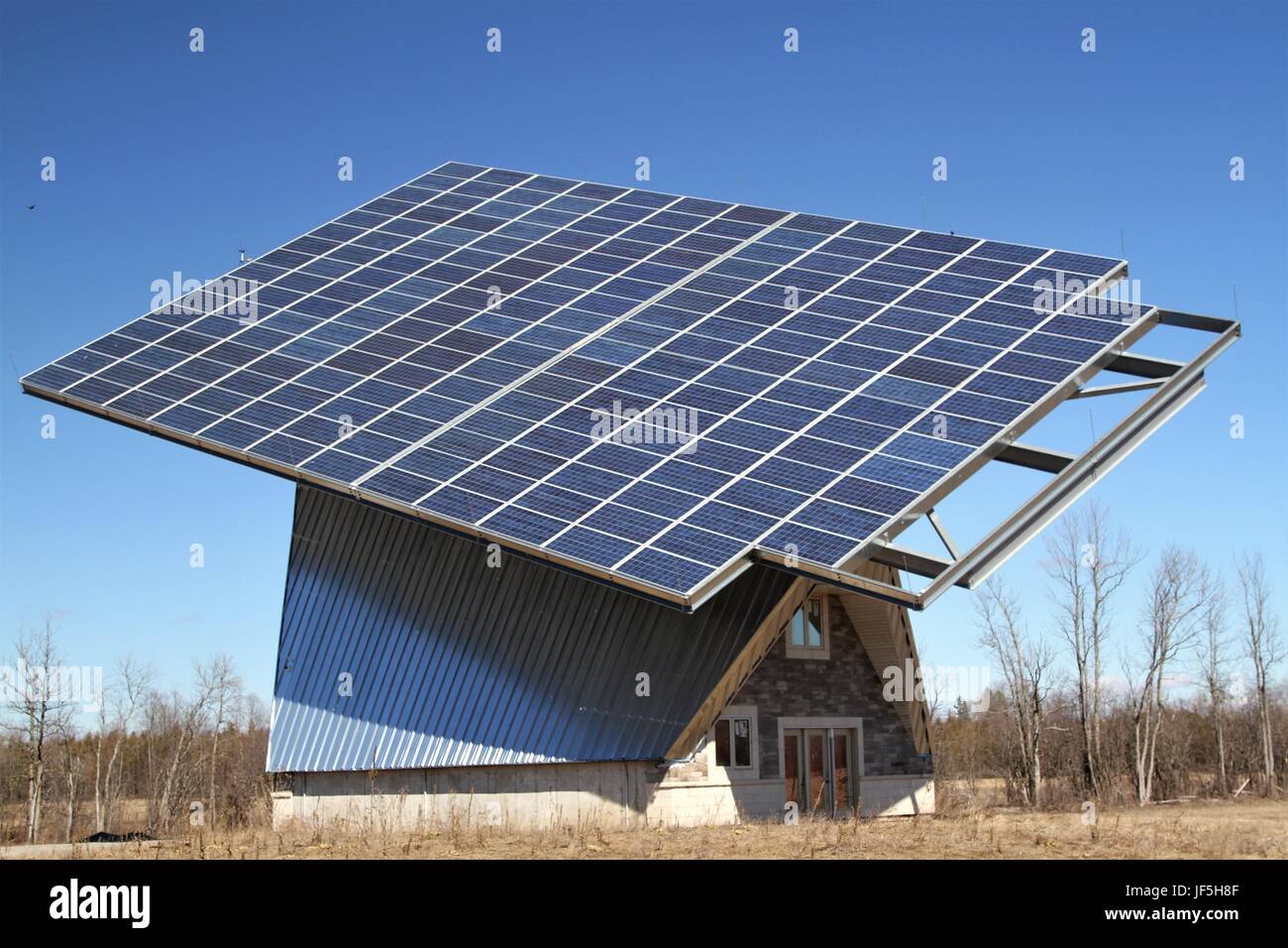 Large solar power on top of roof in rural area Stock Photo - Alamy