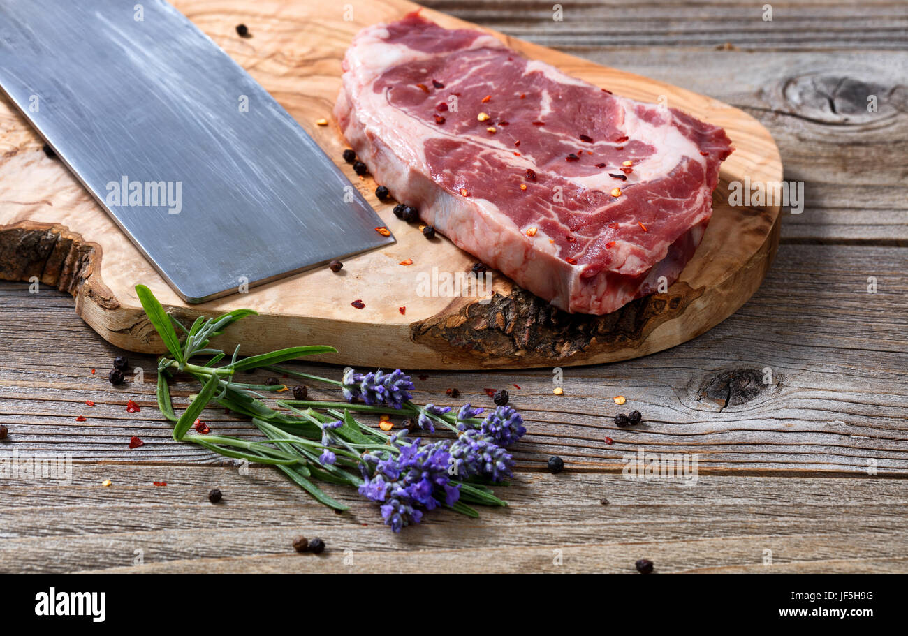 Chopped raw Beef meat on the wooden cutting board, 🇩🇪Prof…