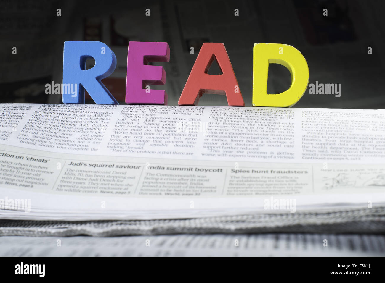 Word read on newspaper Stock Photo - Alamy