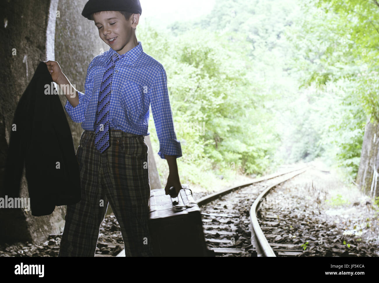 Child walking on railway road Stock Photo - Alamy