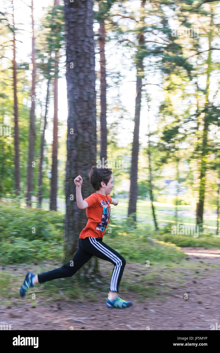 Boy running on pathway hi-res stock photography and images - Alamy