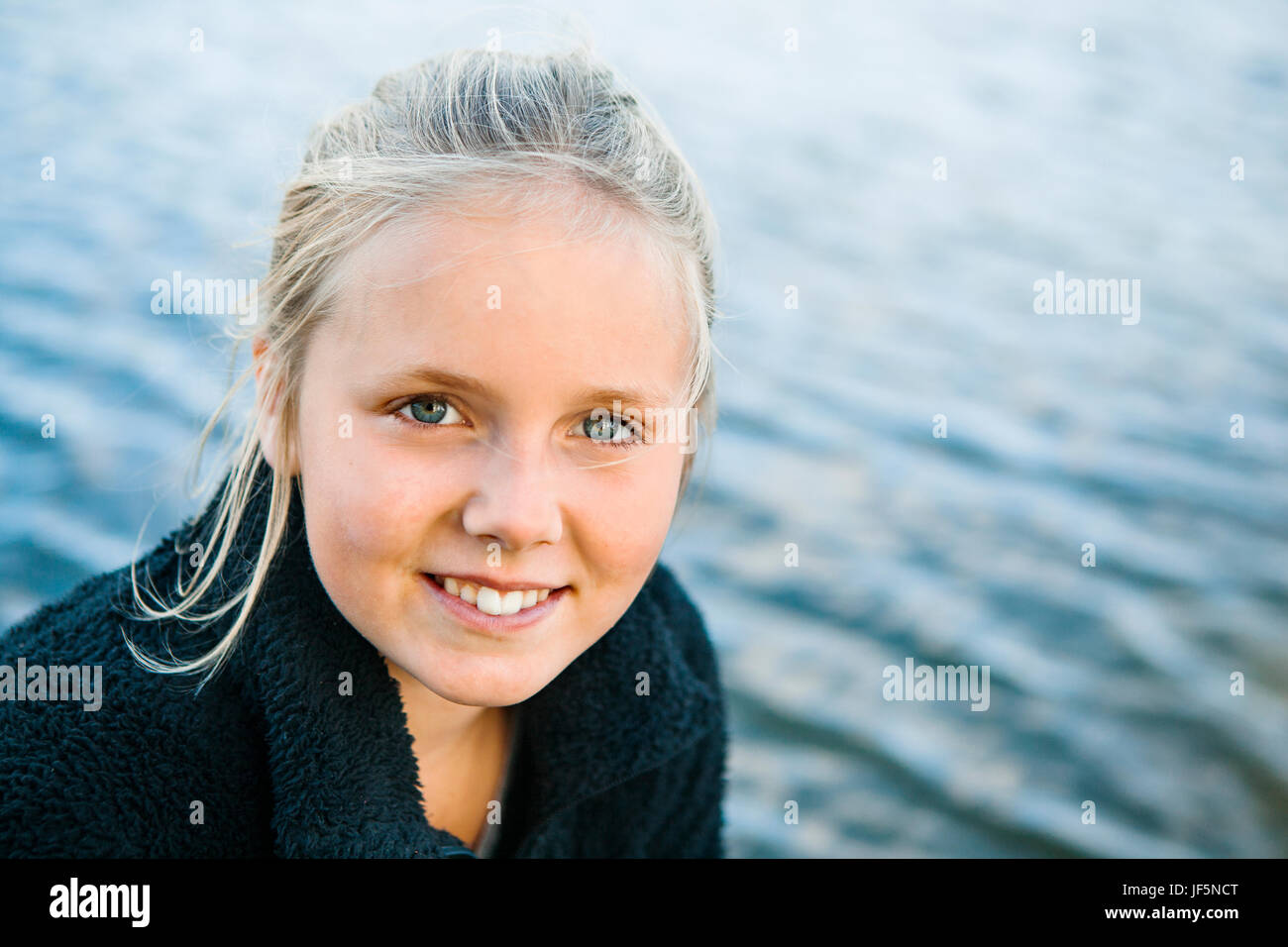 Portrait of smiling girl Stock Photo - Alamy