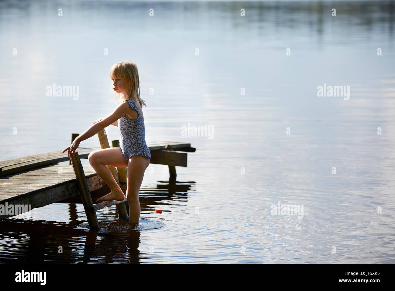 Person ladder barefoot hires stock photography and images Alamy