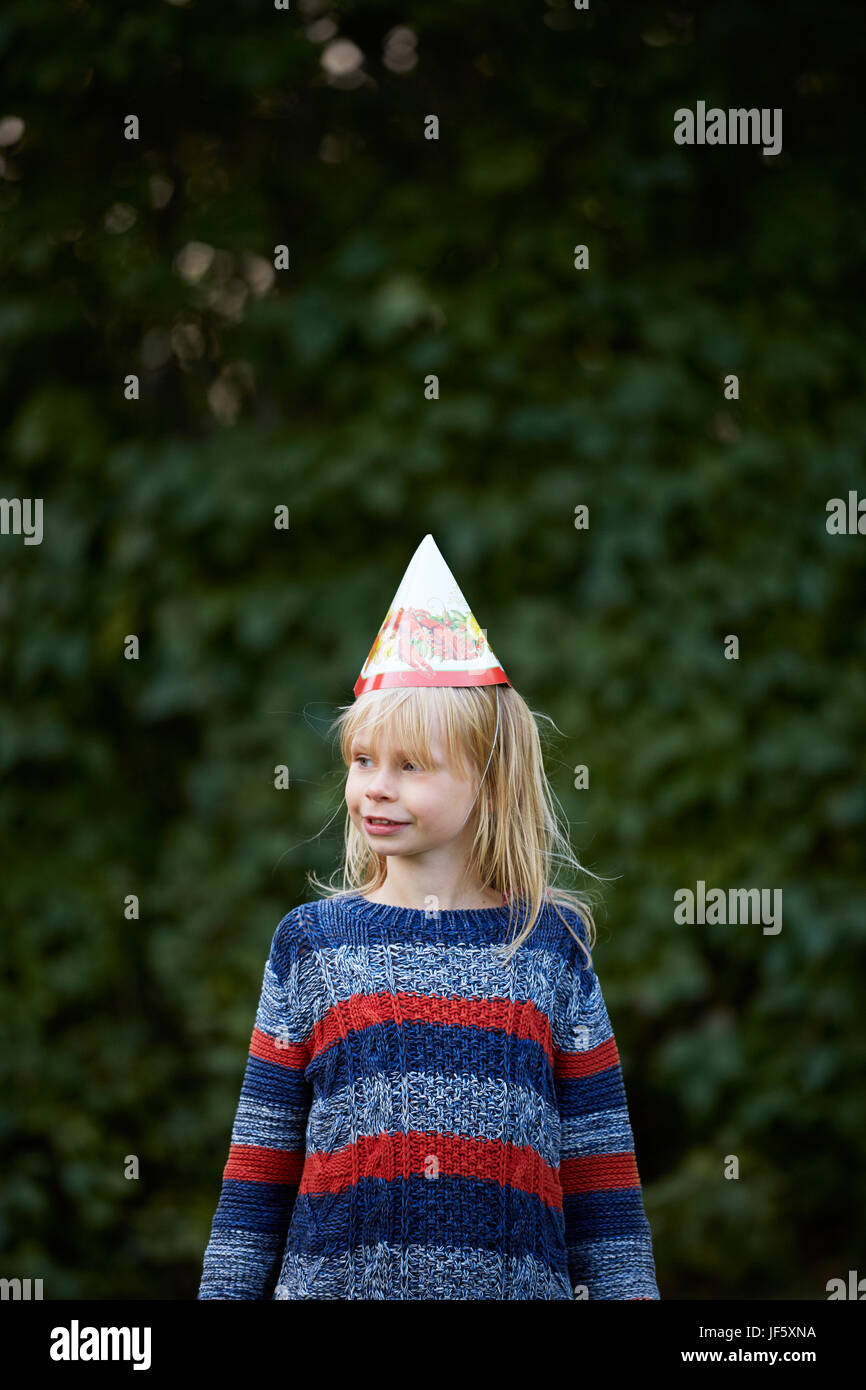 Girl wearing party hat Stock Photo Alamy