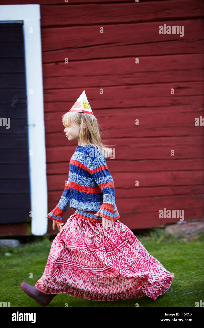 Girl wearing party hat Stock Photo