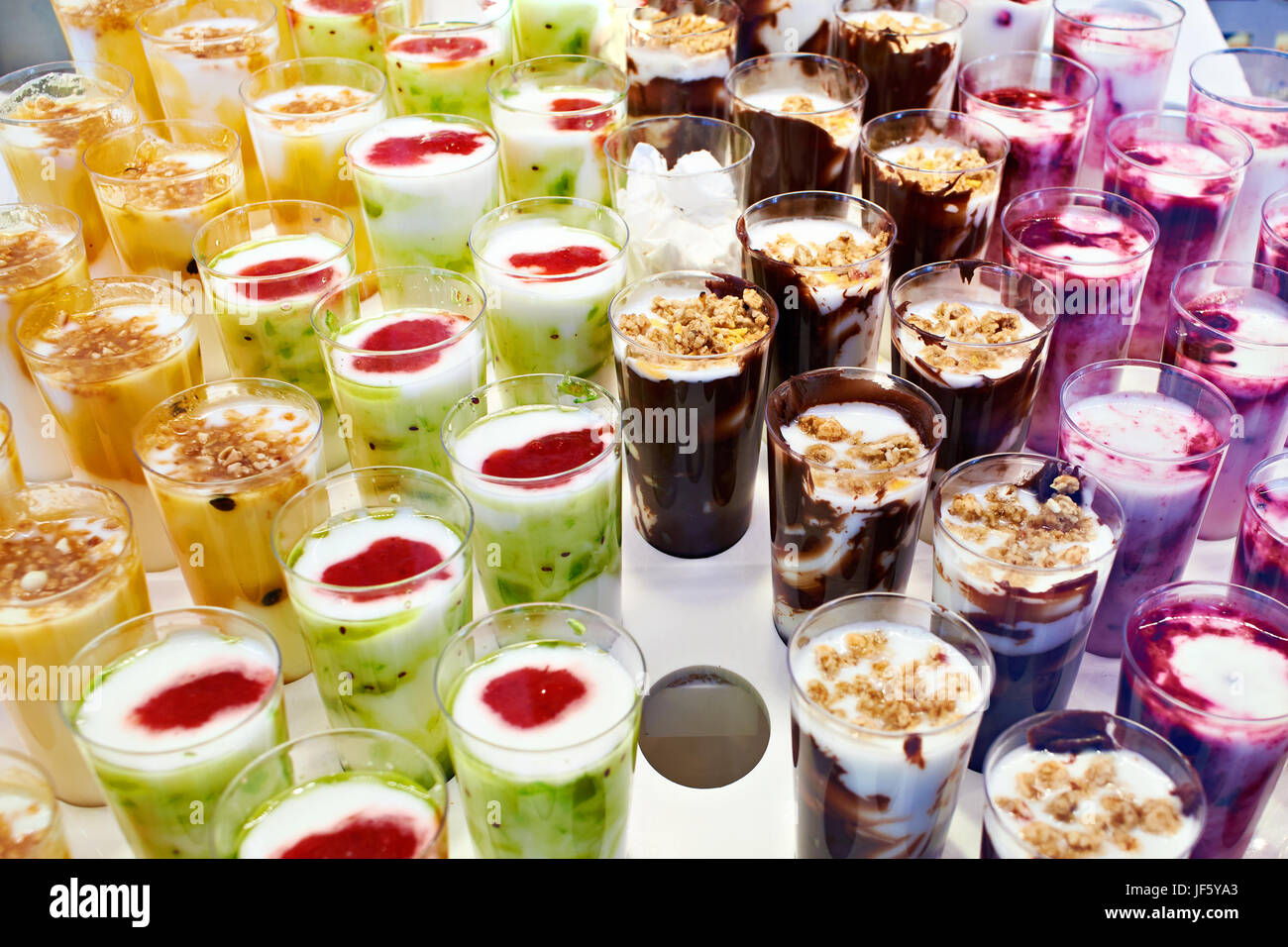 Confectionery fruit desserts on sale at the store counter Stock Photo Alamy