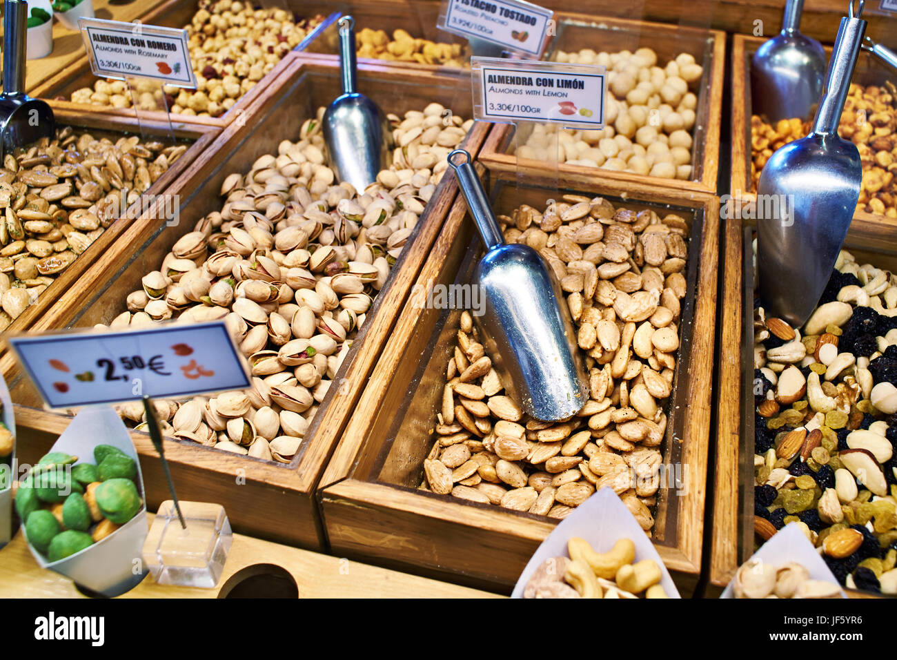 Almonds, pistachios and other nuts on store shelves Stock Photo Alamy
