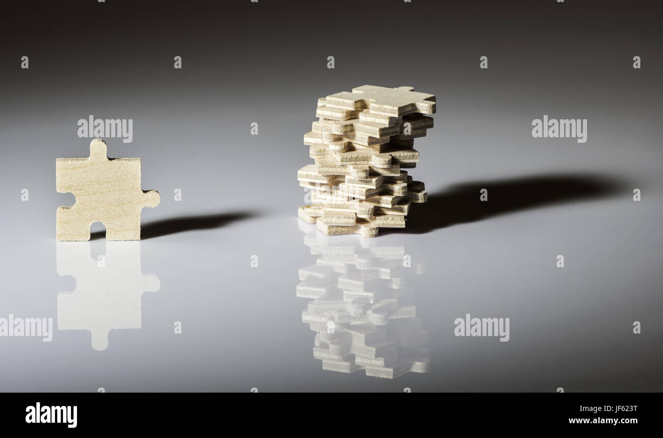 Wooden puzzle on white background Stock Photo - Alamy