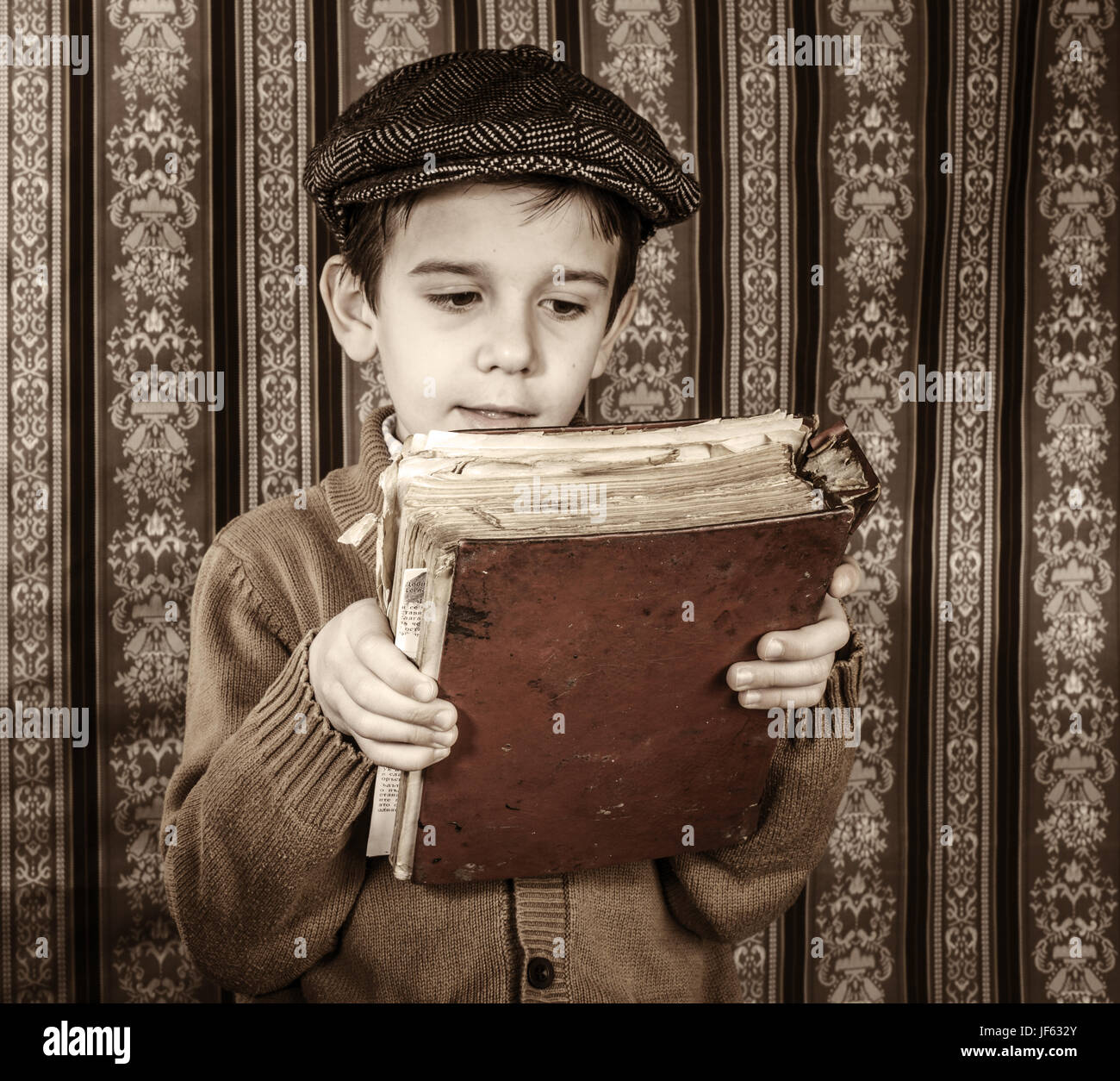 Child with red vintage book Stock Photo Alamy