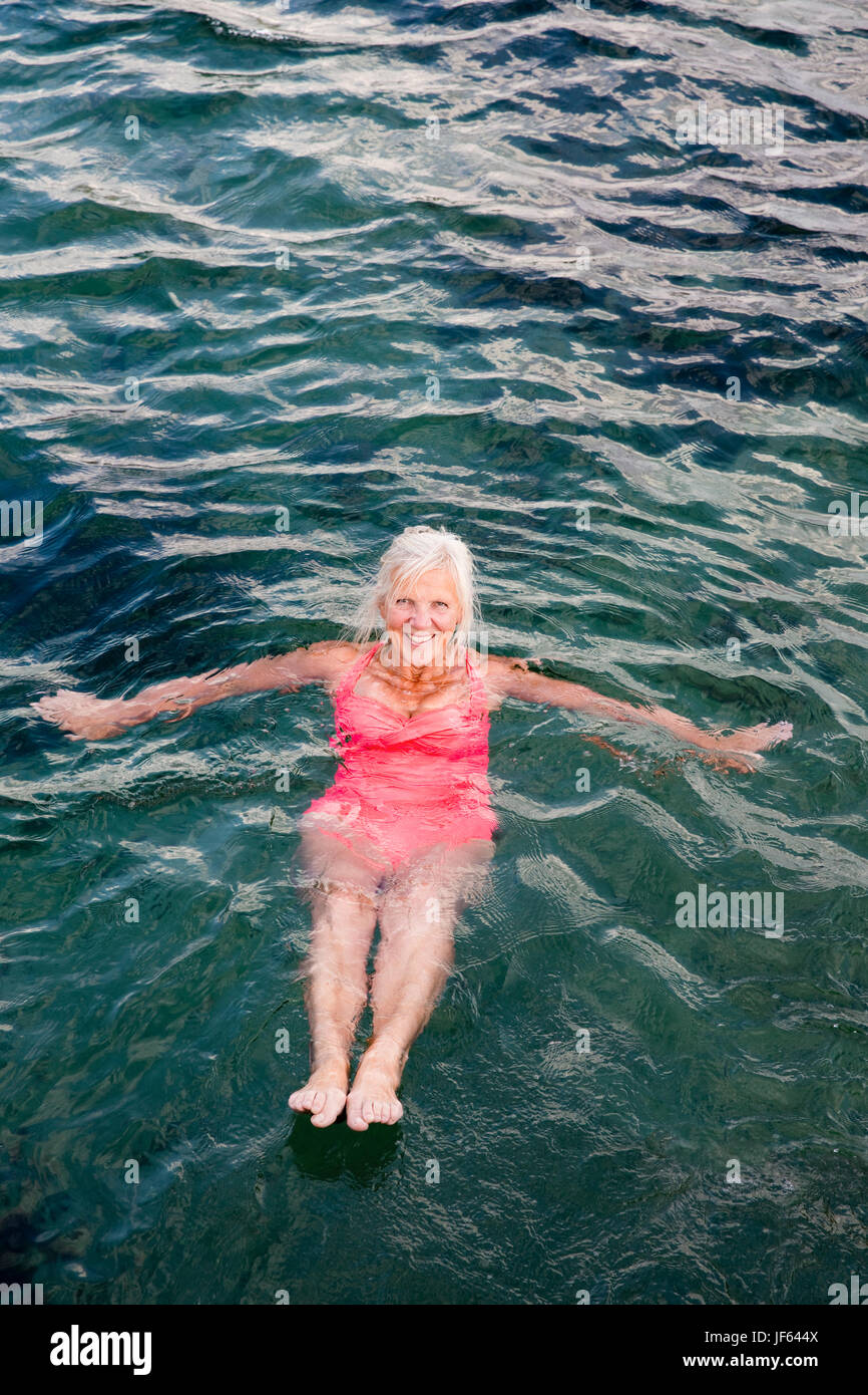 Senior woman swimming hi-res stock photography and images - Alamy