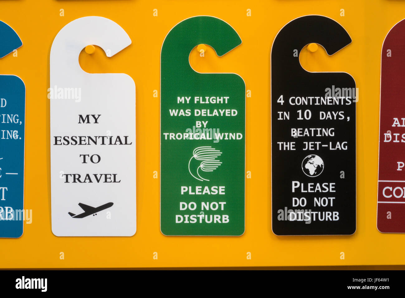 Humorous 'Do not Disturb' Hotel Doorknob Travel Signs, USA Stock Photo