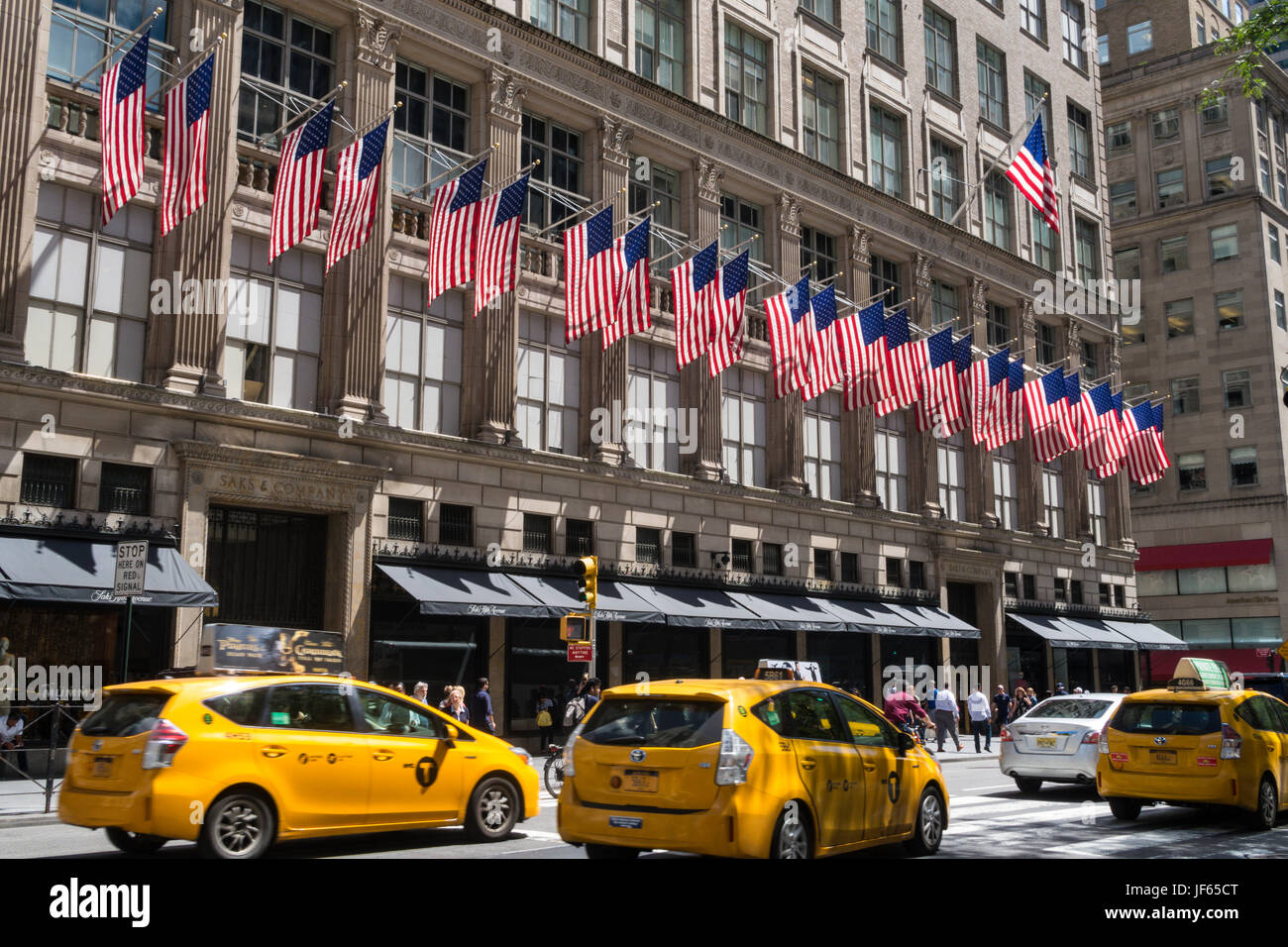 American Flags at Saks Fifth Avenue, NYC, USA Stock Photo