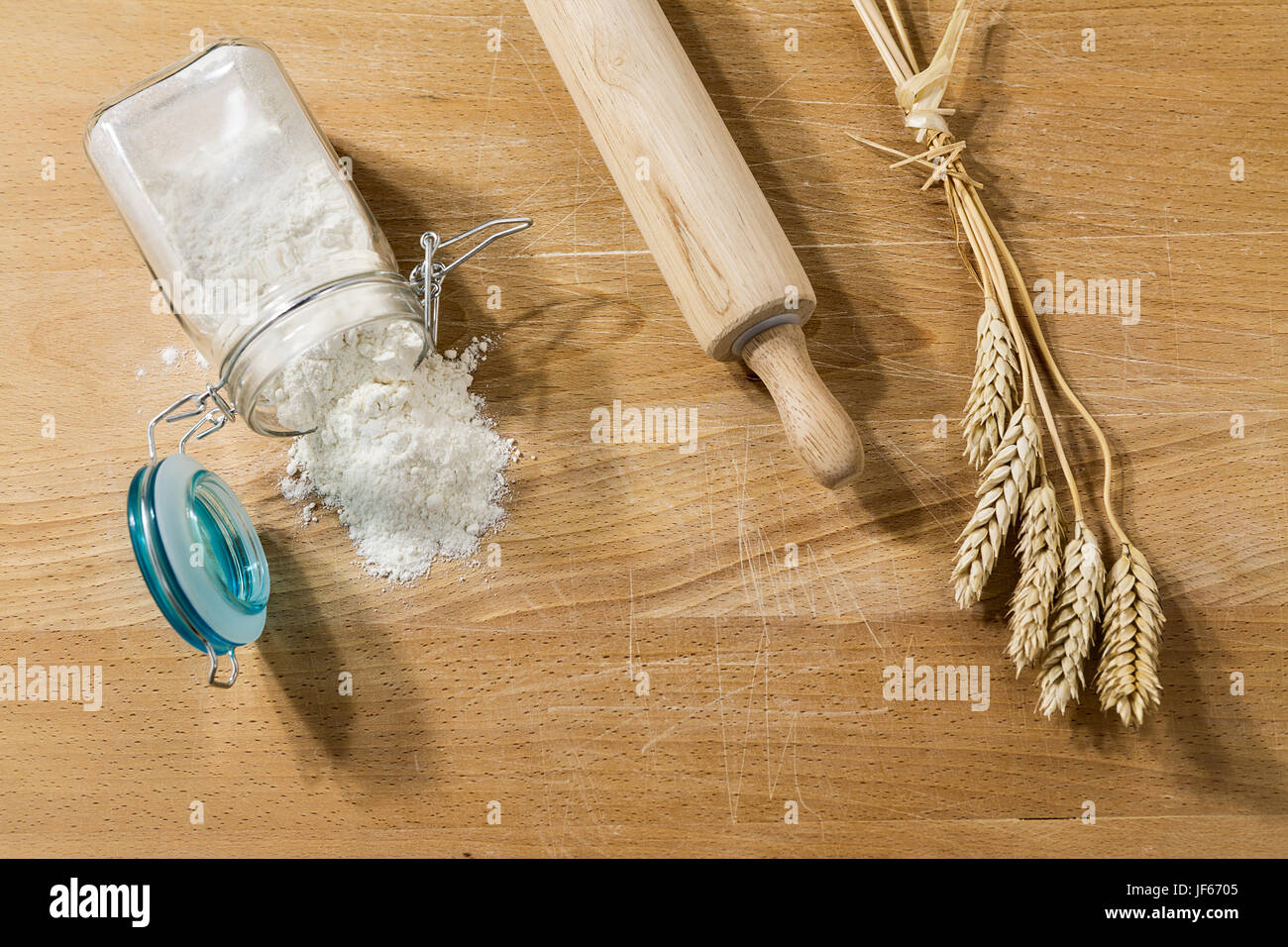 Flour in glass jar on a table Stock Photo Alamy
