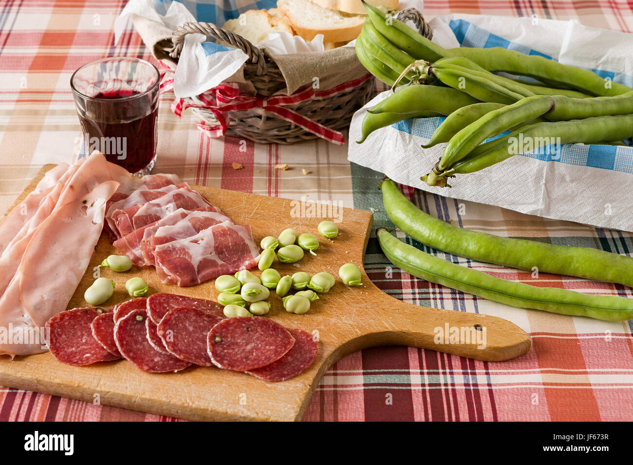 Cold meats broad bean and red wine Stock Photo