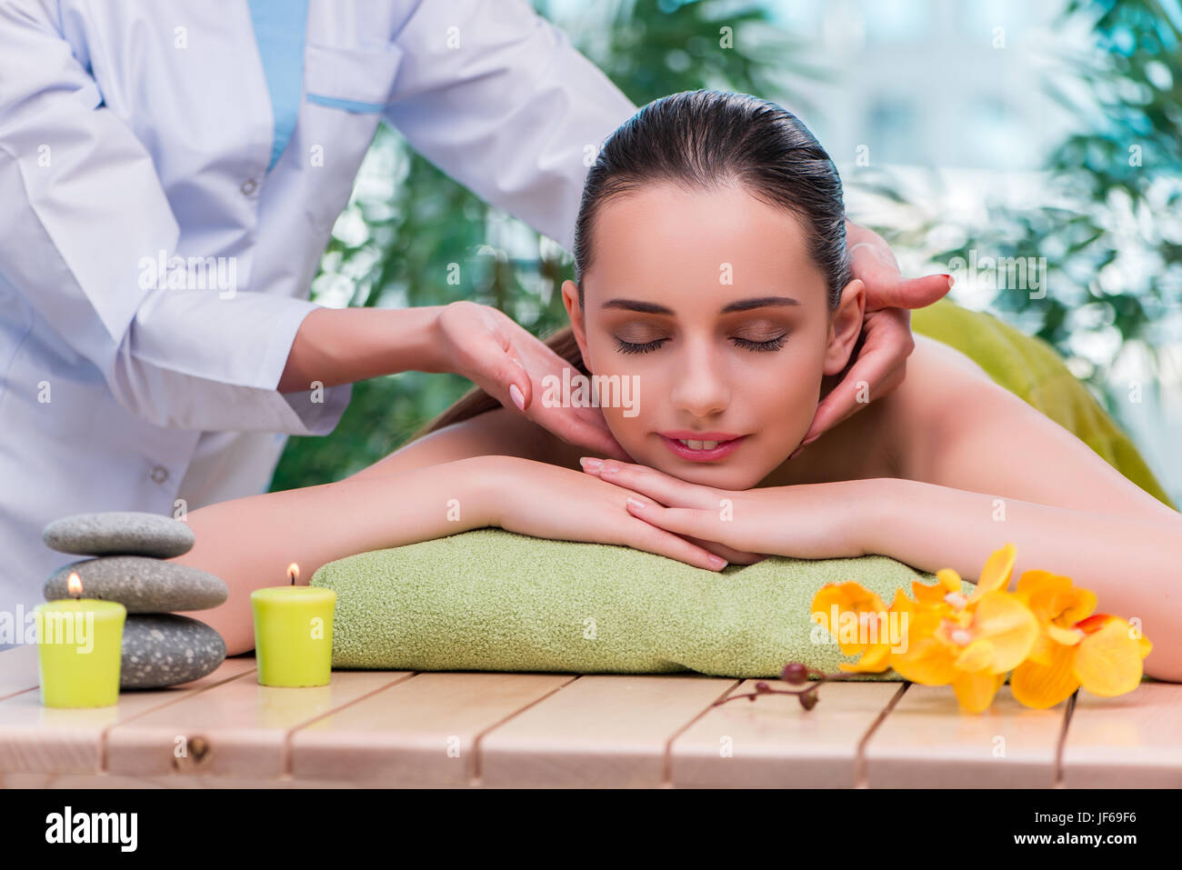 Young woman during massage session Stock Photo Alamy