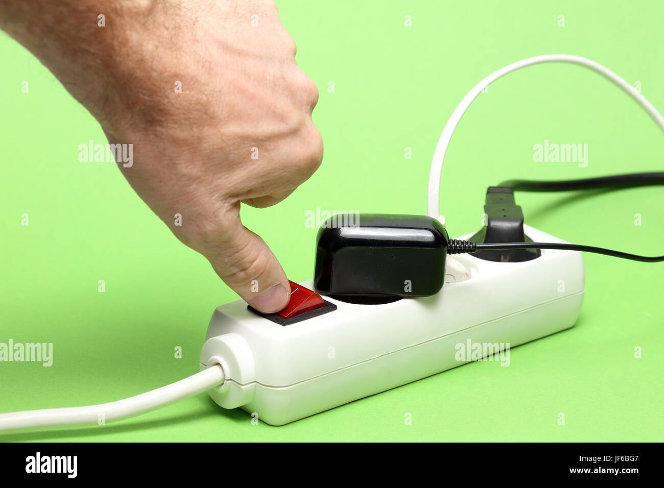 hand switches off Stock Photo
