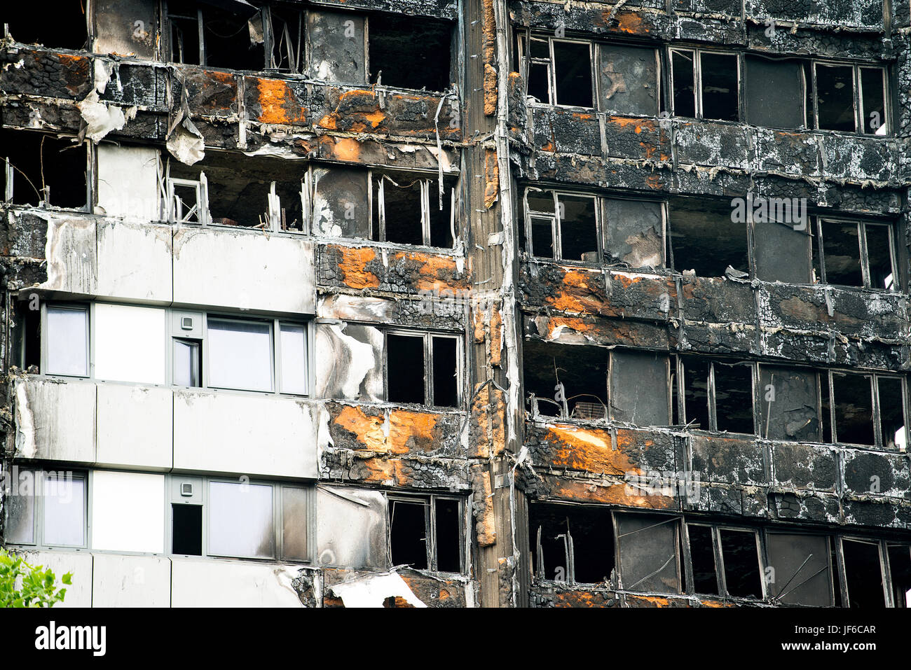 The burnt remains & devastation caused by fire, which ripped through the Grenfell Tower block leaving hundreds homeless and many dead or missing. Stock Photo