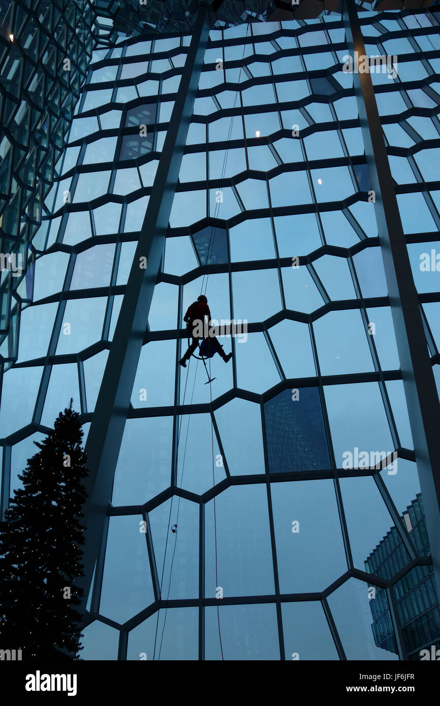 Window Cleaners at the Harpa Concert Hall and Conference Centre Reyjavik, Iceland. Stock Photo