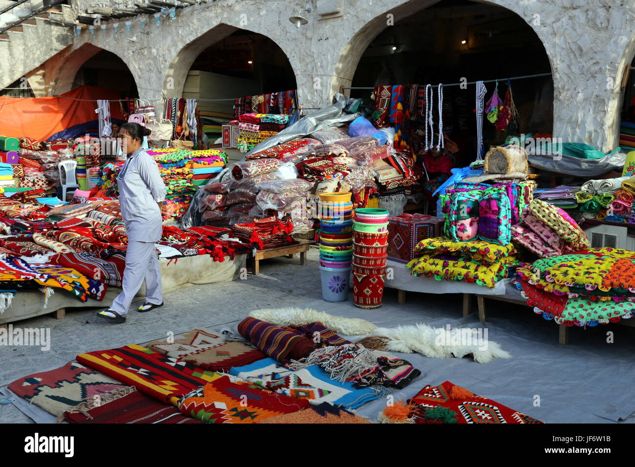 DOHA, QATAR APRIL 9, 2017 Colourful textiles on sale at the Souq Waqif market in Doha, with