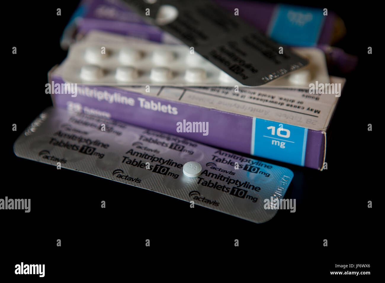 Amitriptyline is used to relieve the chronic pain of arthritis and related conditions. Stock Photo