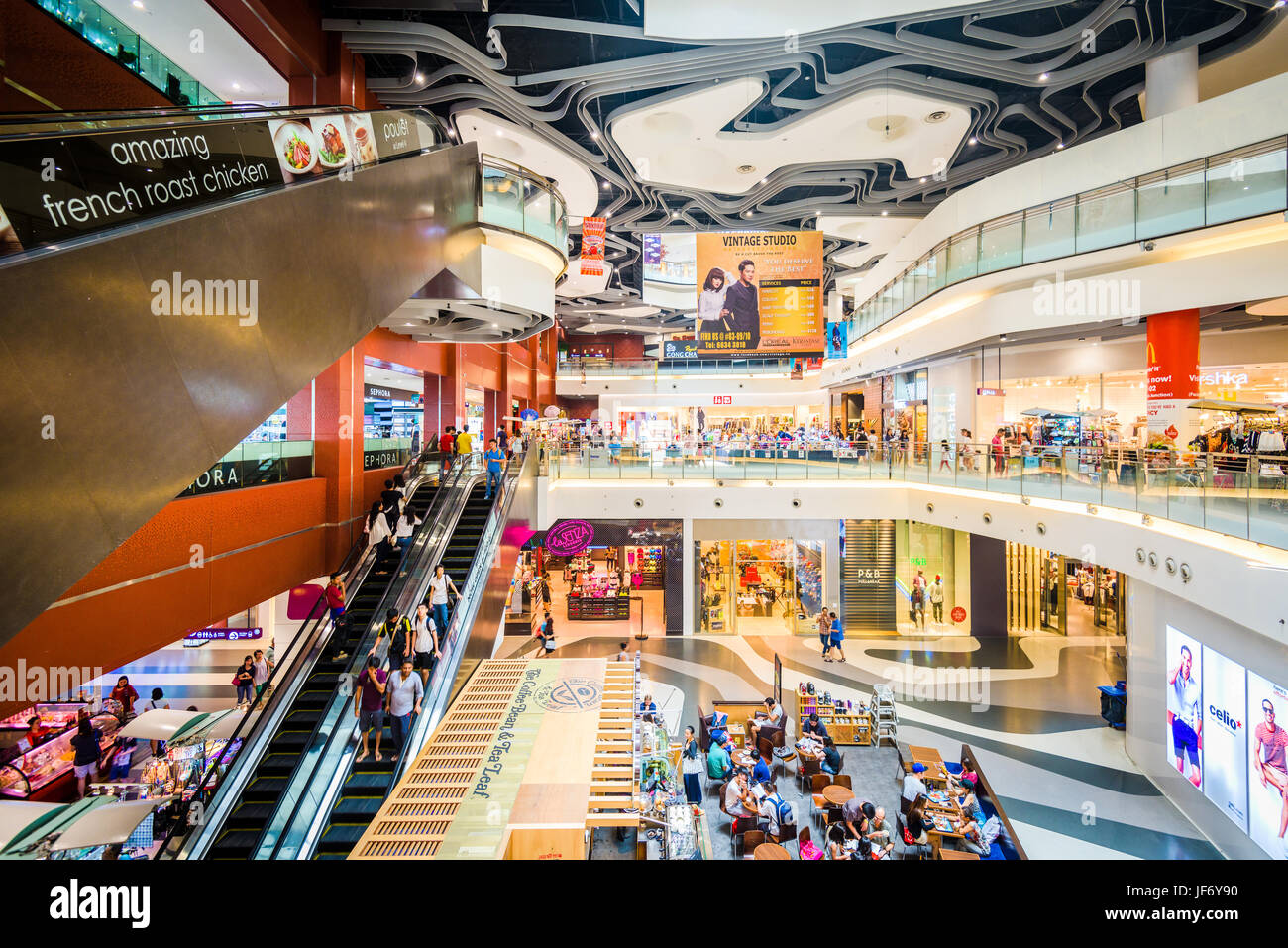 SINGAPORE - SEPTEMBER 4, 2015: The interior of Bugis+ Mall. It is located within the Bugis district of Singapore. Stock Photo