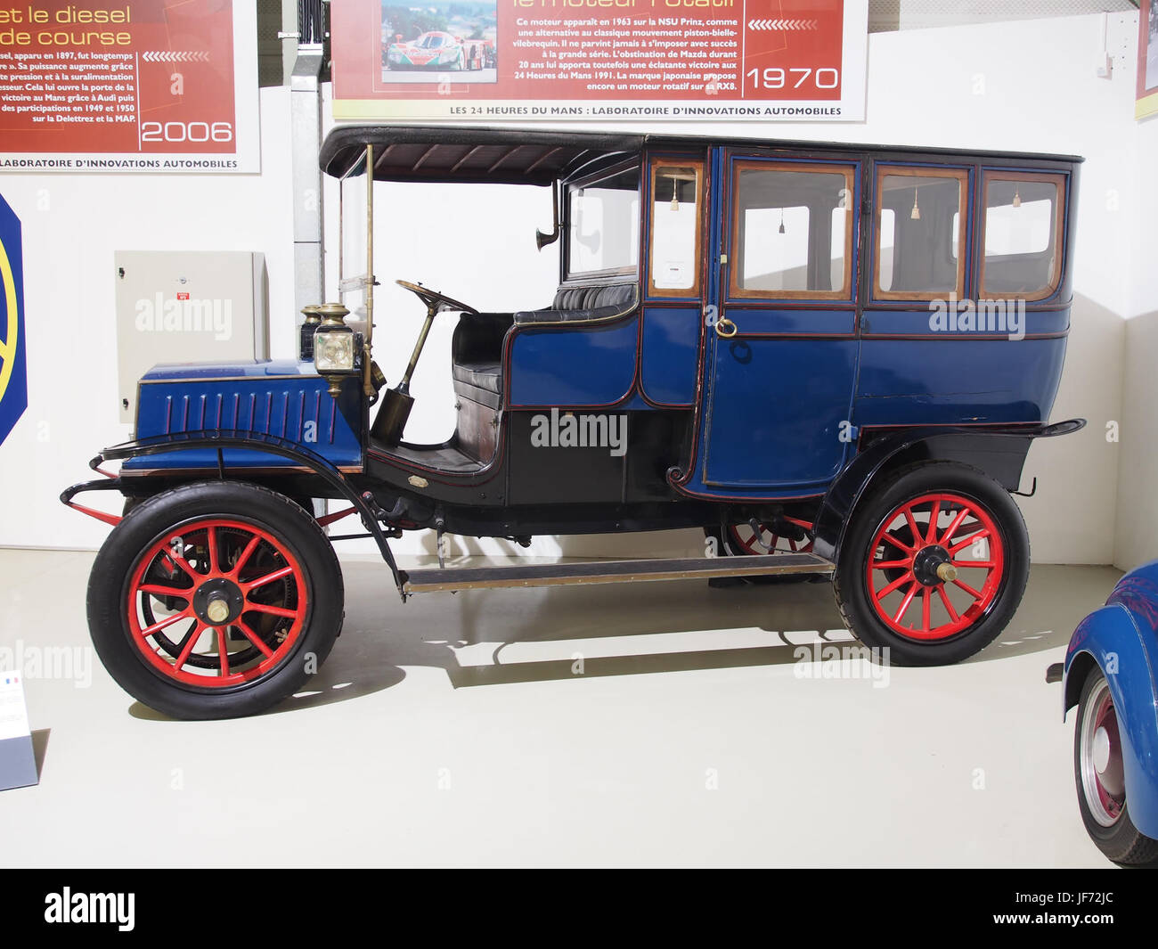 The 1908 Krieger Electrique A 155, an early electric vehicle, powered by two 10hp motors and a voltage of 80V. This pioneering model represents the early stages of electric vehicle technology before widespread adoption in the 20th century. Stock Photo