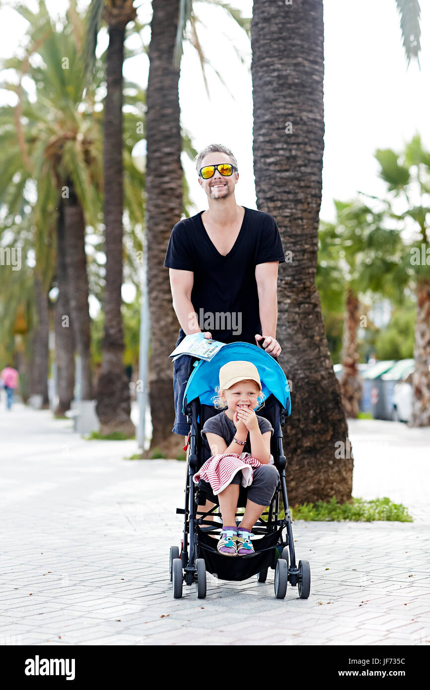 Portrait of father with daughter in park Stock Photo - Alamy