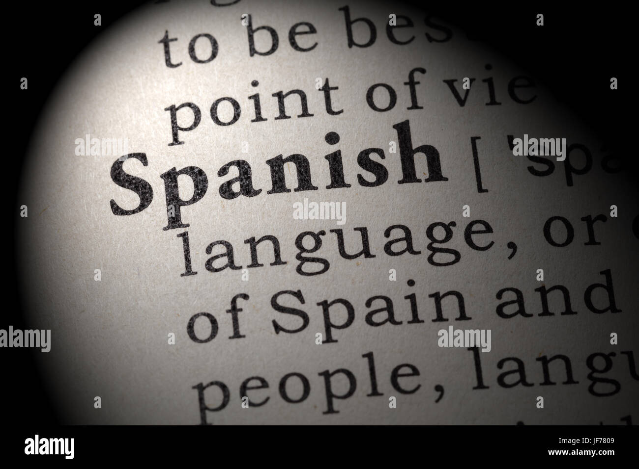 Fake Dictionary, Dictionary definition of the word Spanish. including key descriptive words. Stock Photo