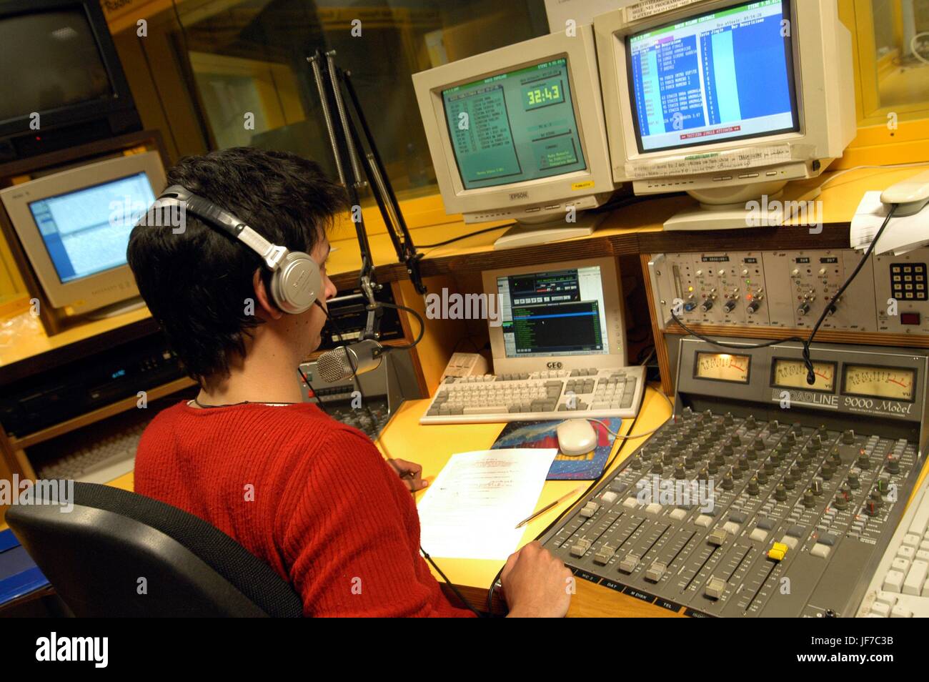 The broadcast studios of Radio Popolare, an independent radio station based in Milan, Italy Stock Photo