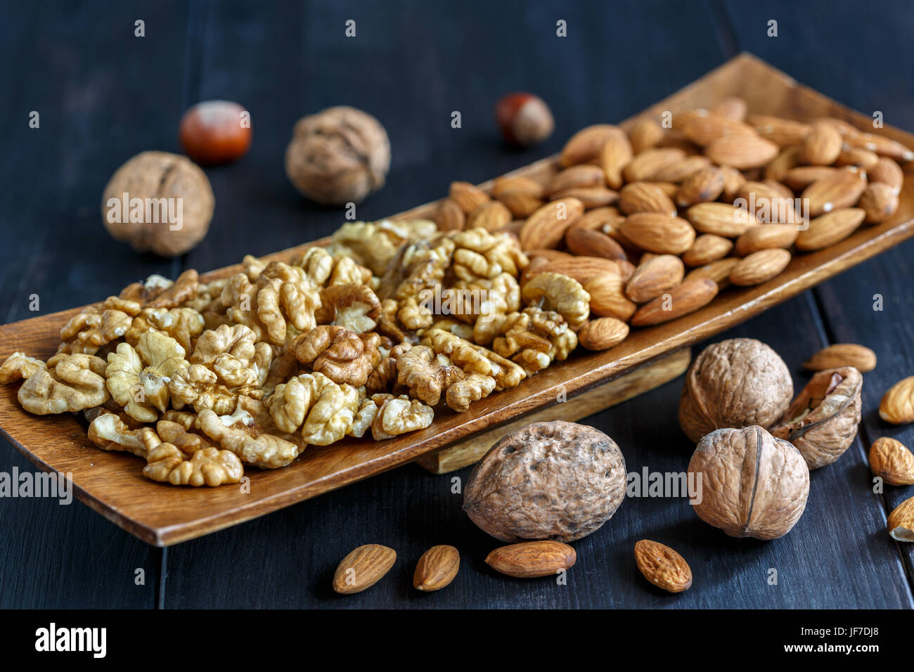 Peeled walnuts and almonds. Stock Photo